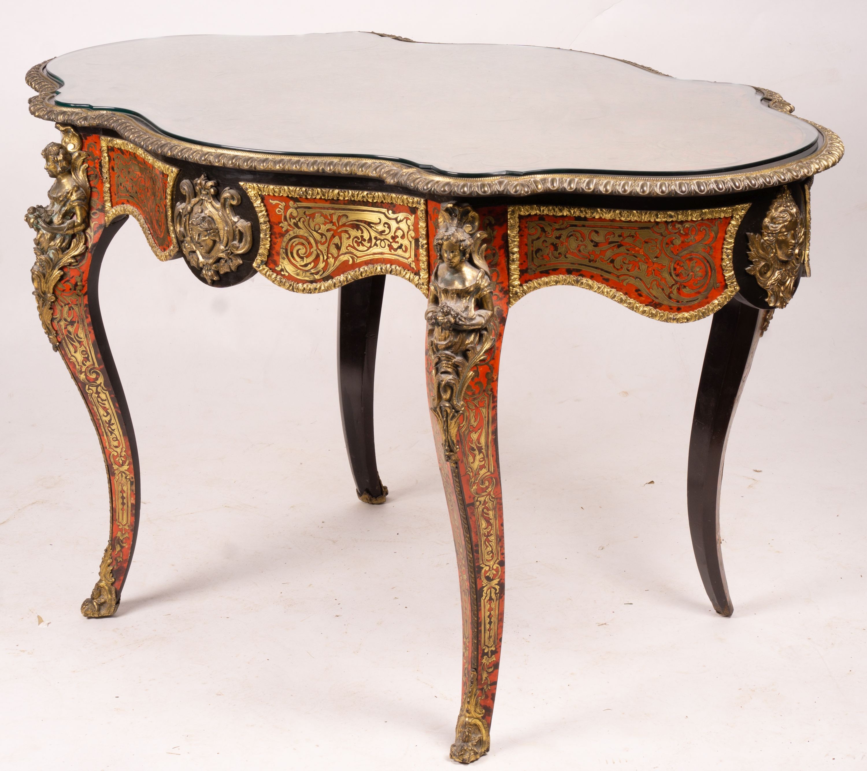 A 19th century Boulle inlaid centre table with shaped oval top, width 130cm, depth 78cm, height 76cm